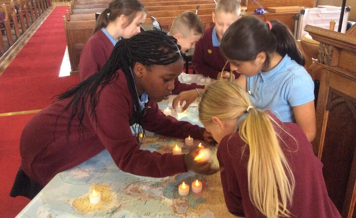 Image of Year 4 visited our church for the Global Week of Prayer, where they participated in activities focused on world peace, community, and healing. A big thank you to Reverend Alice and the church for hosting this meaningful event.