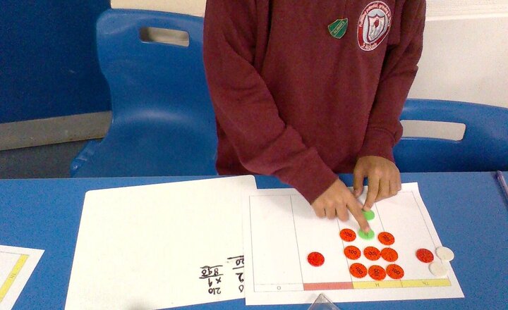 Image of Year 4 worked really hard this morning to multiply a 3 digit by 1 digit number. I was really impressed to see the children using their concrete resources to support learning.