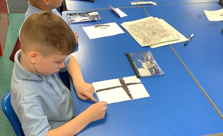 Image of We have also had a little look at religious symbols and what they mean. We have also had a go at drawing these symbols.