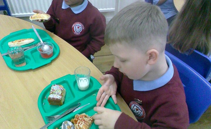 Image of Reception class really enjoyed pizza and fish fingers for lunch yesterday. Full tummies all round.