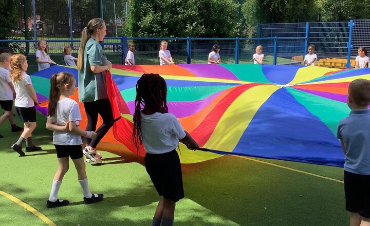 Image of What a busy week we have had in Year 1! We started the week by playing with the parachute in the sunshine.
