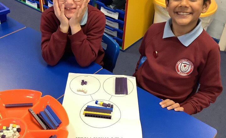 Image of Our topic in Maths is Place Value. Today we have been partitioning numbers to 100 using the base 10 equipment and our part - part - whole models. Great work Year 2!