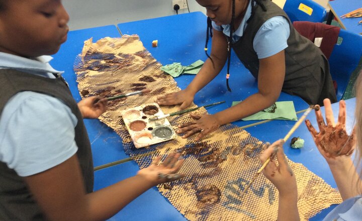 Image of Our Year 3 art project has been a prehistoric adventure! We've mastered new drawing skills, experimented with natural pigments, and recreated the feel of cave walls. Plus, we've worked together to create stunning hand paintings. It has been so much fun!