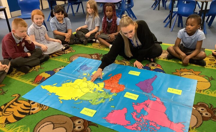 Image of Today in Geography, we successfully reviewed the 7 continents, locating them on a map. We then learned about the 5 oceans, singing a song and identifying their locations.
