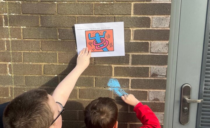 Image of We have been working in the way of Keith Haring. Creating art in his style outside in the playground and on the side path. Don’t forget to come and have a look at what we have created. Let us know what you think at hometime tonight on the yard.