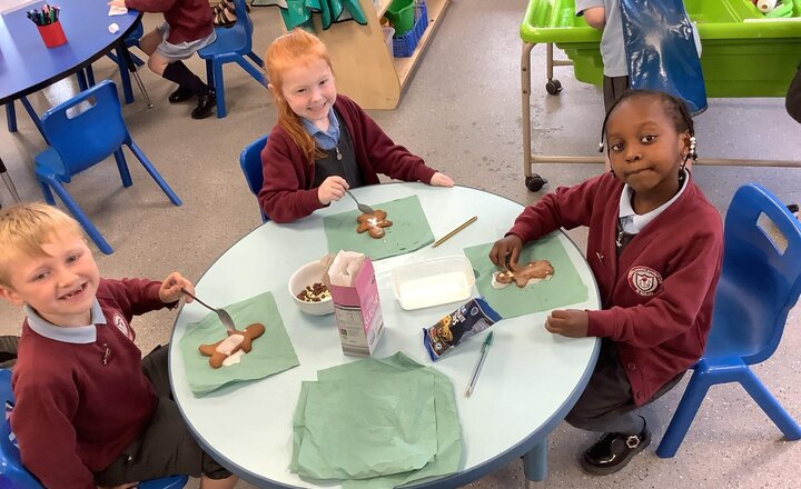 Image of Decorating our gingerbread men.