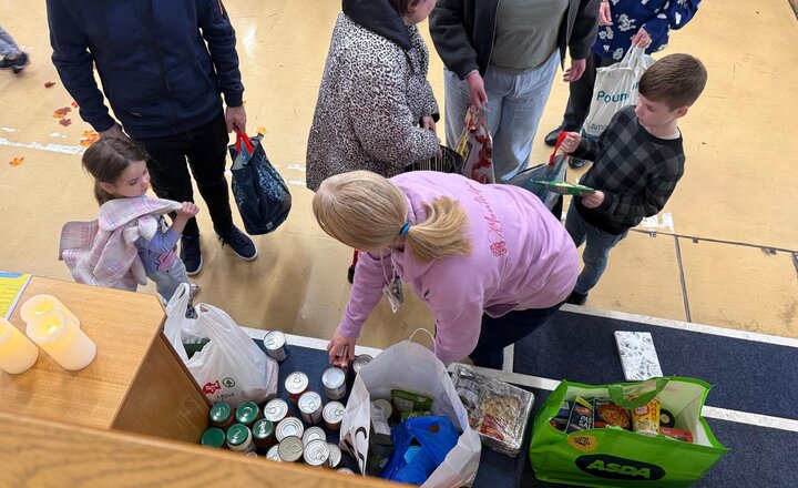 Image of Reverend Alice invited members of the school, church and wider community to bring forward their harvest donations. These will be taken and donated by school to the Billy project on Friday 3rd October.