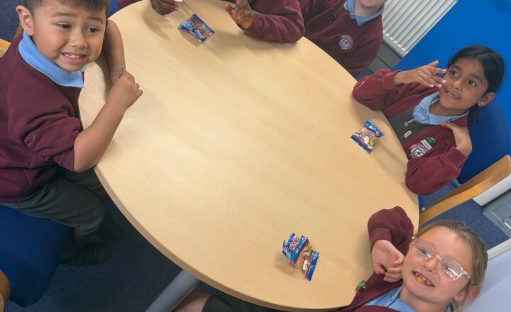 Image of Here are this week's VIPs. Having a cheeky hot chocolate, pack of sweets or biscuit and discussing the values we have shown in and around school this week.