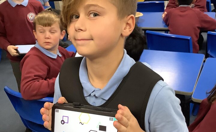 Image of Year 5 began their Junior Jam iDebuq unit (iProgram Session 1). They learned how computer programs work before creating shapes using code and then debugging existing programs to identify and fix errors.