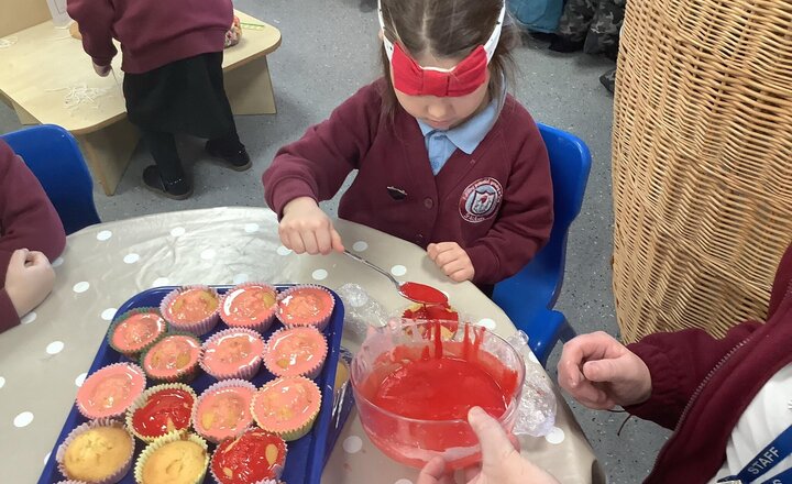Image of Decorating our cakes for Adrianna's birthday party tomorrow.