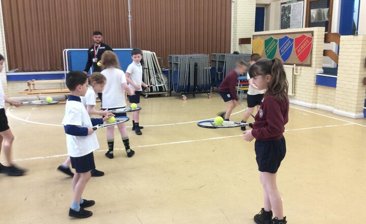 Image of Racket skills in action! Yesterday, Year 4 joined Jake for a brilliant PE session. We learned the anatomy of a racket, perfected our grips, and worked hard on our balance and juggling skills. Look at that control!