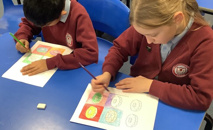Image of This week, our budding artists dived into the vibrant world of Pop Art. We took inspiration from the legendary Andy Warhol to create our very own donut masterpieces.