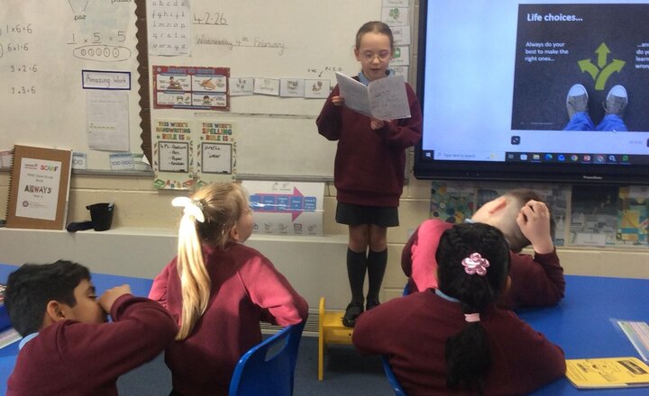 Image of Sharing our home learning  Emily brought in a story she has planned, written and edited from home. She was excited to share this story with her peers and read it aloud on the speak out step. Thanks for sharing Emily.