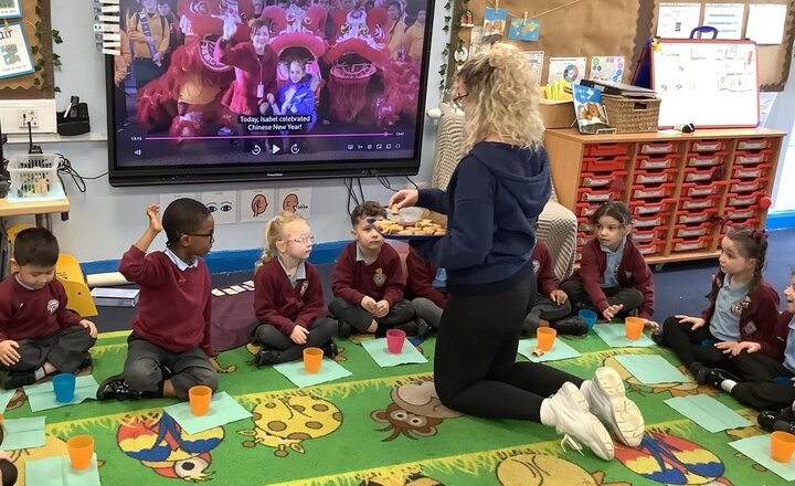 Image of After recalling our knowledge of the history of Chinese New Year, we learnt about the type of food that is eaten and the dragon & lion dances in the parade. Reception loved trying some spring rolls and prawn crackers.