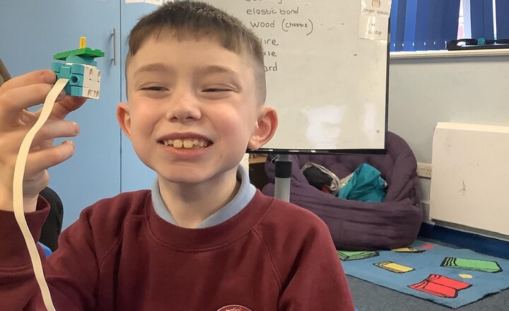 Image of Today we started our design technology week.  We have started to look what can make a vehicle move.  In teams we started with our Lego kits attaching a battery and motor.