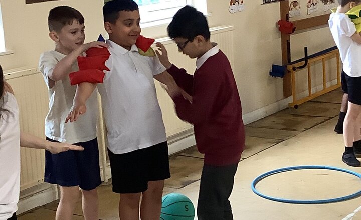 Image of Lots of bouncing and balancing in PE today.