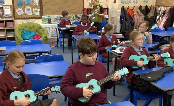 Image of We are excited to continue our ukulele lessons with Junior Jam, building on prior knowledge to move beyond the basics. Pupils are now advancing their skills by mastering complex chords and refining their strumming techniques.
