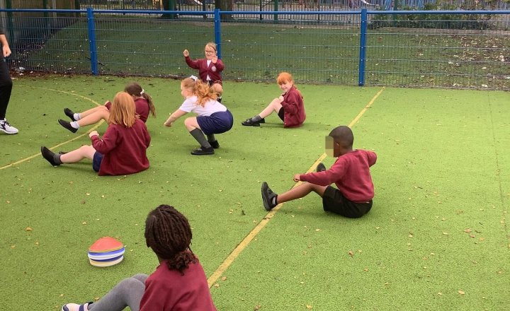 Image of Outside getting fresh for PE.  Learning how to dodge and work as a team. 🌅