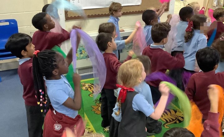 Image of Scarf dancing has arrived! 🧣 Our pupils used colourful scarves to move to the rhythm, building the key motor skills, coordination, and wrist strength needed for writing. They loved swirling to the music and did a fantastic job!