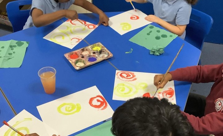 Image of Today in Art, we have been creating spirals using a different medium. We used paints in the primary colours. They did a fantastic job!🌀🎨