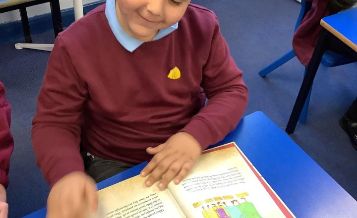 Image of RE 📖 Rev Alice visited to show us different Bibles. We learnt it has 66 books across two Testaments, was first written in Hebrew, and is constantly translated. She shared how reading it helps her feel connected to God.