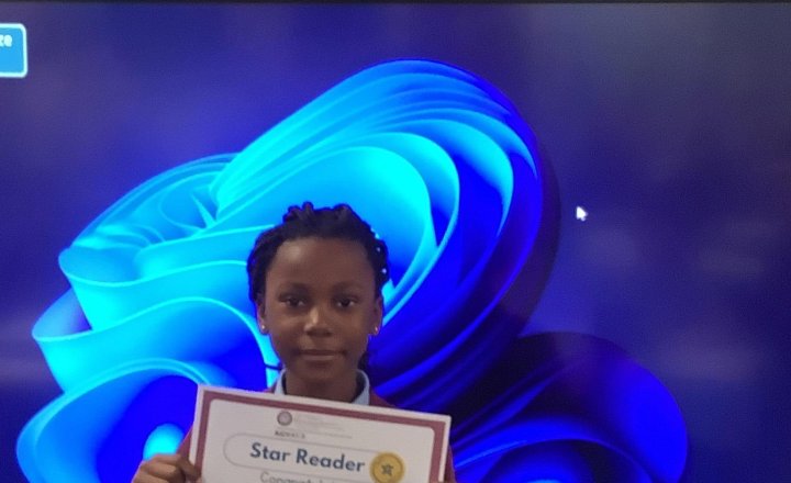 Image of How wonderful to see Somma as our reader of the week in year 3 🌈