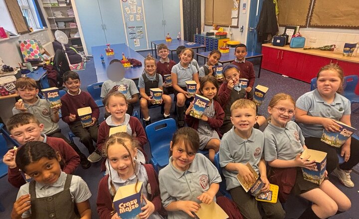 Image of It’s mystery prize day in Year 2 as a reward for our fantastic attendance. We are having a movie morning with popcorn.