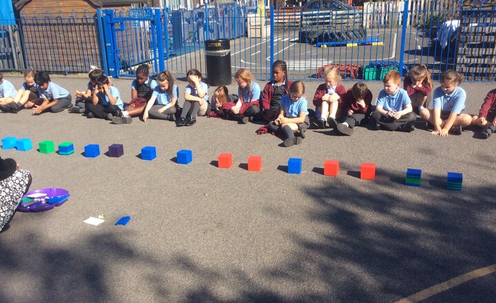 Image of Yesterday we were learning that the Stone Age lasted for approximately 3.4 billion years! We went outside with our base 10 to help us understand how long ago this actually was. The children were amazed! They had a great time exploring the concept of time.