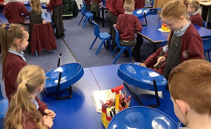 Image of Year 2 have had a super busy week! Here we are enjoying dance in PE with Blackburn Rovers, using instruments in music with Junior Jam and using objects around our classroom for our measurement unit in Maths.