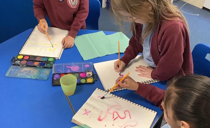 Image of In Art today, we have used a new medium which is water colours. We have added more water, used different brushes and created patterns.