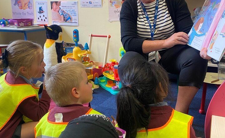 Image of Enjoying story time at the library.