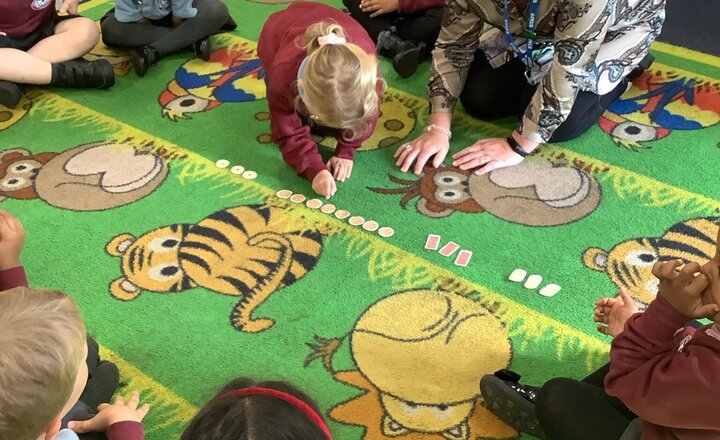 Image of Sorting the biscuits in maths.