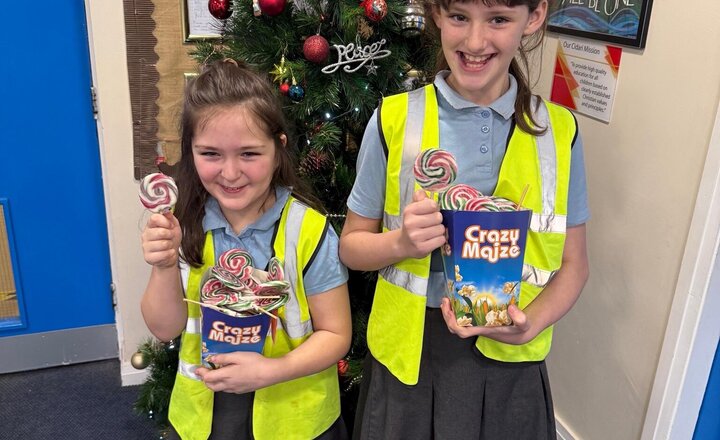 Image of Thank you to Mrs Jones and my two cheeky elves for sorting 188 lollies today but a bigger thank you to Rummage Rescuers Mill Hill Community Shop for donating the Christmas lollies to all of the children.