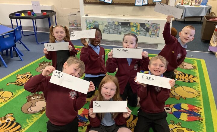 Image of Working hard in their phonics intervention with Mrs Egan this morning.