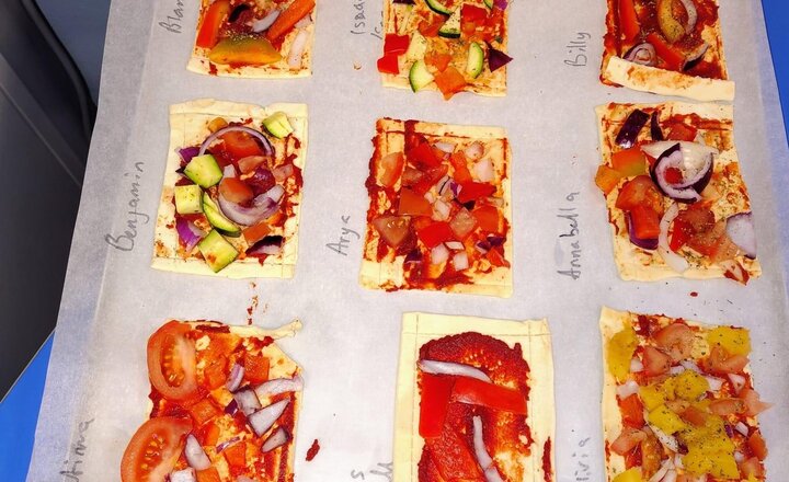 Image of Seasonal Veg Tart Fun! The children got hands-on creating colourful seasonal vegetable tarts today! They showed great teamwork and learned about where food comes from and the benefits of seasonal eating. Fantastic cooking skills everyone!