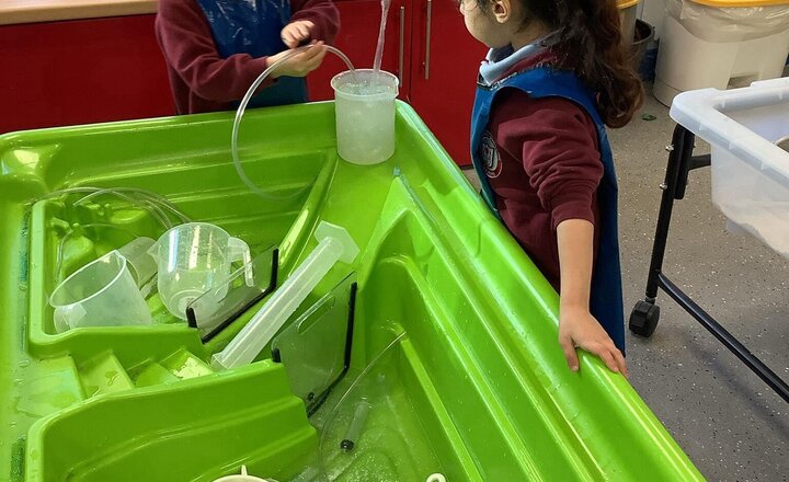 Image of We have been using a variety of scientific equipment in our water area. Ask your child what they have been using!