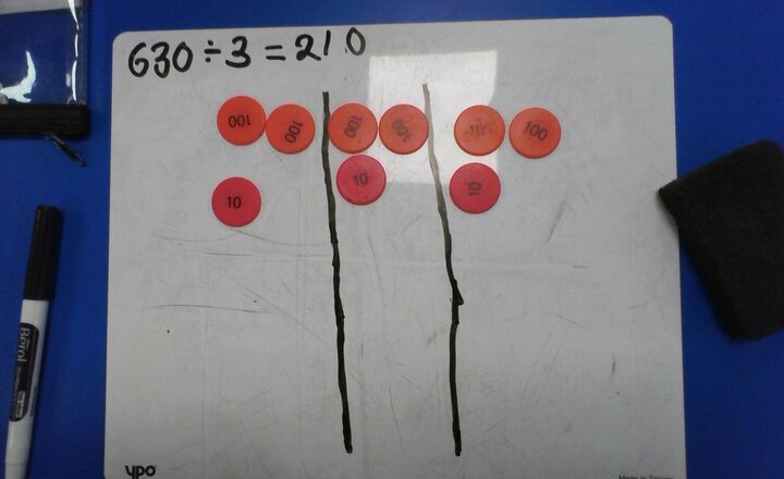 Image of In Maths today we have been looking at dividing 3 digit numbers using a practical method.