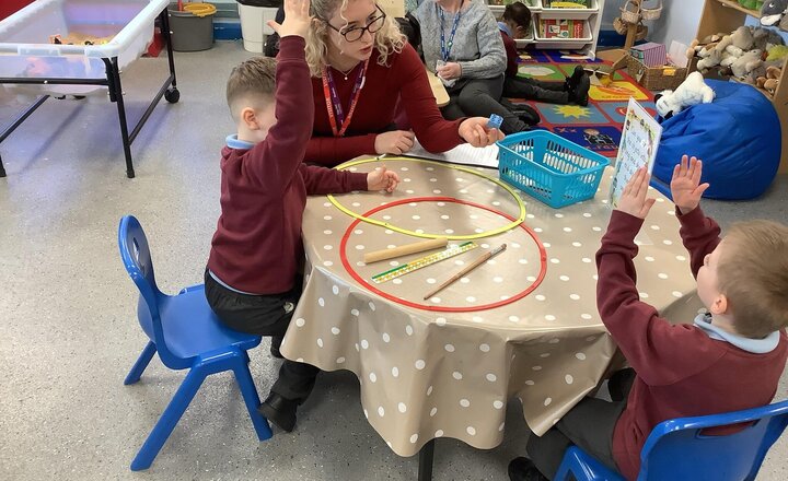 Image of Working hard in the maths area.