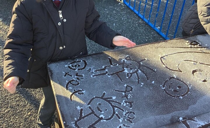 Image of Fun in our icy outdoor area this morning.