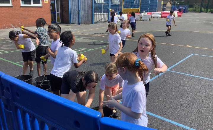 Image of What a brilliant afternoon! As a reward for always making the right choices and following our 'Always Rights', the children earned a well-deserved class water fight. They had a blast cooling down and celebrating their fantastic behaviour. 🌊