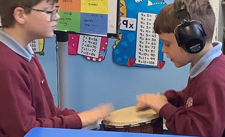 Image of 🥁 Rhythms and Beats: Learning the Djembe in Music!