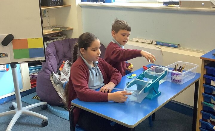 Image of Today in maths we are learning about mass. We worked in groups to see which objects are heavier, lighter and equal in mass.