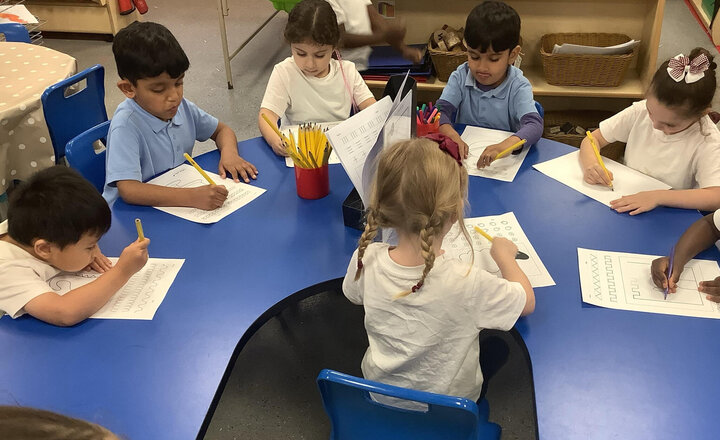 Image of Working on our pencil control in reception.