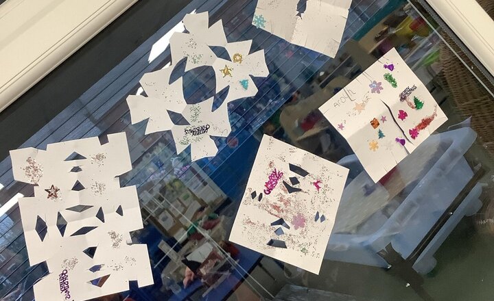 Image of Impressive Christmas artwork in Reception, Snowflakes and Christmas trees!