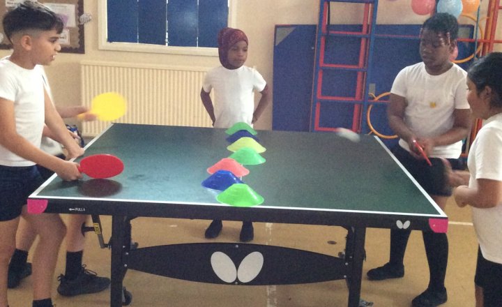Image of ​🏓 Keeping cool and building skills! 🏓 ​With the high temperatures yesterday, we adapted our PE lesson and took over the hall to play table tennis. It was a fantastic opportunity for the children to work on their reflexes, agility, and teamwork.