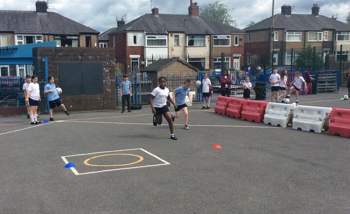 Image of Sharp Skills on the Playground!  Year 4 had a brilliant PE session on the playground this afternoon, focusing on our fielding skills. 