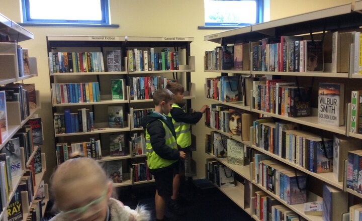 Image of Earlier today, we had an exciting English experience lesson where we visited Mill Hill Library. We explored the world of new and old books and spoke about how books can take us to places we have never been before.