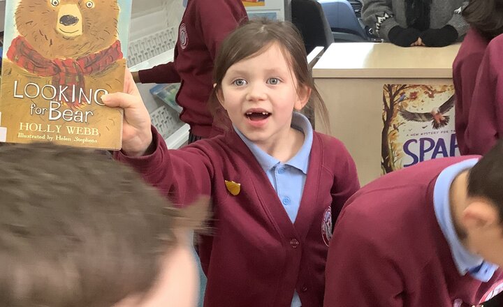 Image of The library bus came to our school this morning, and the children were excited as they picked out new books for our library.