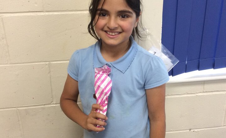 Image of Asma was one of the 'Lucky Tray' winners today for Pizza Day. Enjoy your prize from Cath.