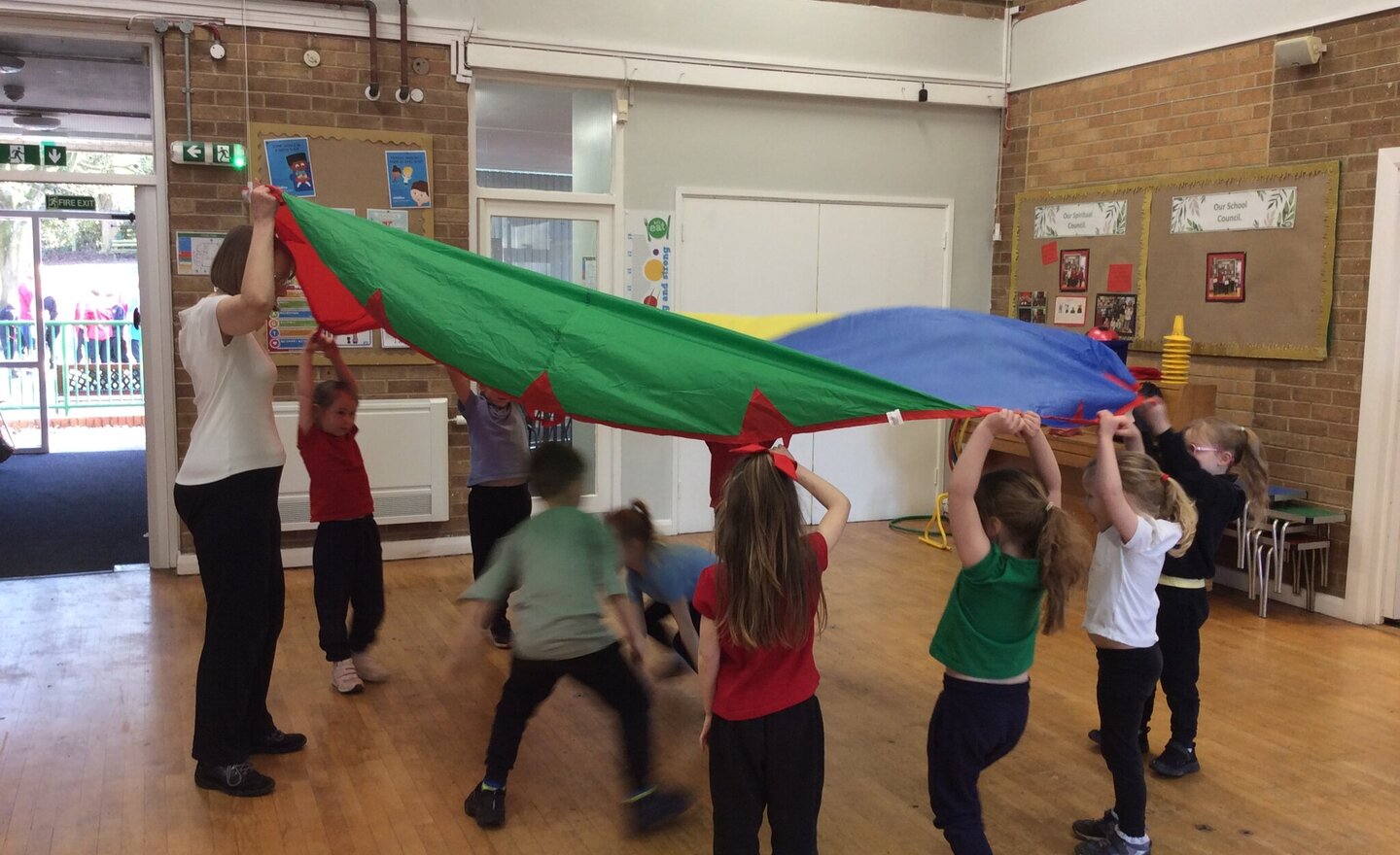 Image of Up, Up And Away! Parachute PE in Action!
